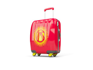Luggage with flag of kyrgyzstan. Suitcase isolated on white