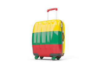 Luggage with flag of lithuania. Suitcase isolated on white