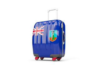 Luggage with flag of montserrat. Suitcase isolated on white