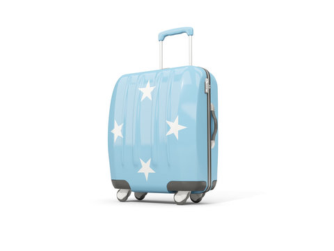 Luggage with flag of micronesia. Suitcase isolated on white