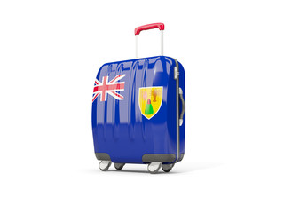 Luggage with flag of turks and caicos islands. Suitcase isolated on white