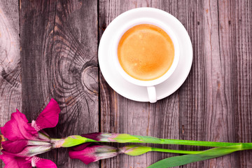 cappuccino in a white cup with a saucer