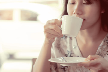 woman drinking hot coffee at morning / relax time