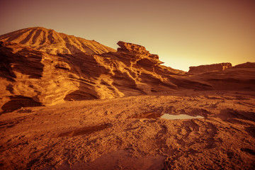 Red sunset desert like martian landscape