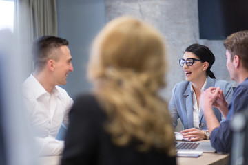 Startup Business Team At A Meeting at modern office building