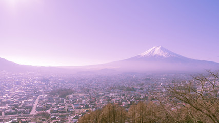 cityscape from small town with fuji mountain beautiful clear sky background (soft focus)