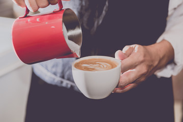 Barista is making coffee