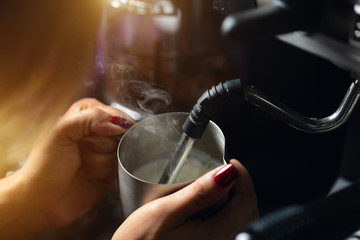 barista making coffee