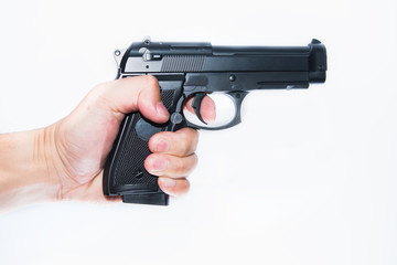 Hand holding gun
