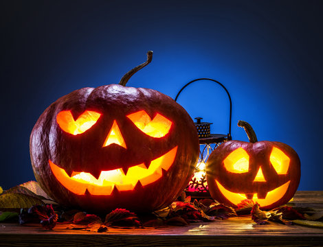 Grinning pumpkin lantern or jack-o'-lantern is one of the symbols of Halloween. Halloween attribute.