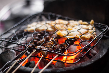 grill sate and tempe at iconic traditional food angkringan photo taken in jogja yogyakarta indonesia