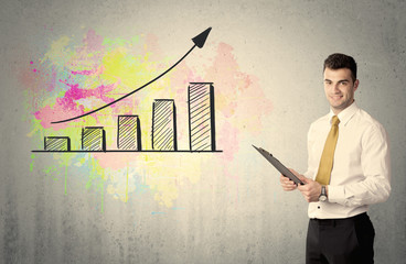 Happy businessman with colorful chart