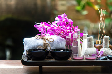 Thai Spa Treatments aroma therapy  salt and sugar scup and rock massage with orchid flower.  Healthy Concept. copy space,select and soft focus
