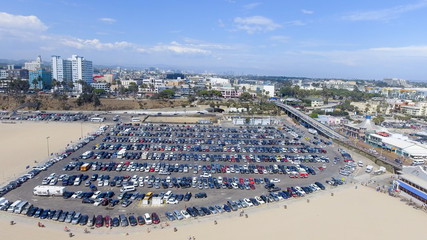 SANTA MONICA, CA - AUGUST 2ND, 2017: Santa Monica Pier and parking from high viewpoint. This is a major attraction in Los Angeles area