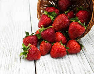 ripe strawberries on wooden table