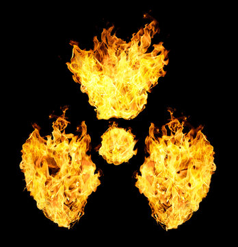 Nuclear symbol from fire flames isolated on black background.