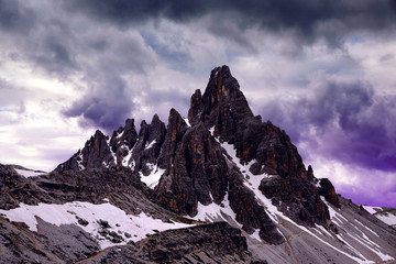Mountain landscape with storm clouds in Sexten Dolomites. Mount Paternkofel in South Tyrol, Italy.