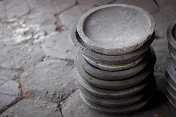 a traditional stone pestle mortar stack