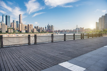 Obraz premium Chongqing city skyline, with wooden floors and guardrails.