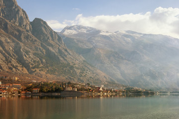 The seaside village of Dobrota with Mount Lovchen in the background. Bay of Kotor (Adriatic Sea), Montenegro