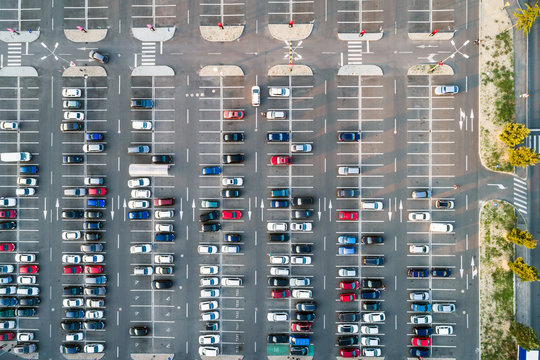Cars in a parking lot seen from above