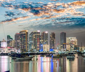 San Diego, California. Night view of Downtown buildgs with water reflections