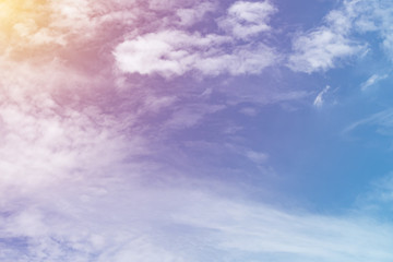 sun and cloud background with a pastel colored


