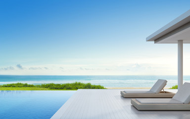 Luxury beach house with sea view swimming pool and terrace in modern design, Lounge chairs on wooden deck at vacation home or hotel - 3d illustration of residential building