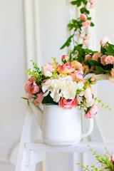Obraz na płótnie Canvas Bouquet different flowers in vase