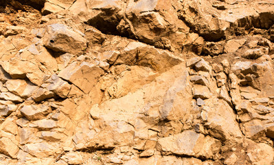 Stone cliffs in the mountains as a background