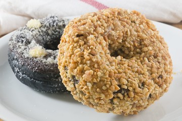 Dish of Fresh Chocolate Donut and Peanuts Donut