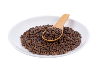 Morning glory seed in white plate and wood spoon isolated on white background