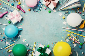 Holiday frame or background with colorful balloon, gift, confetti, silver star, carnival cap, candy...
