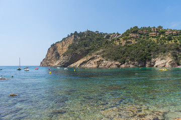 Coves of Cala Llorell beach in Tossa de Mar, Spain