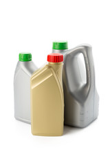 Plastic bottles from automobile oils isolated on white