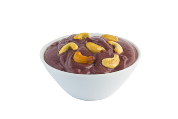Acai into a bowl with nuts