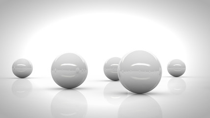 five white reflective spheres blending into a bright white environment 
