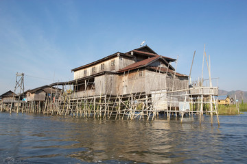 Fototapeta na wymiar Traditional wooden stilt houses on the Lake Inle Myanmar