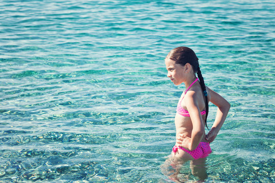 Teen girl enjoying the sea