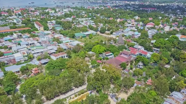 Aerial View Tropical City with Buddhist Temple Complex