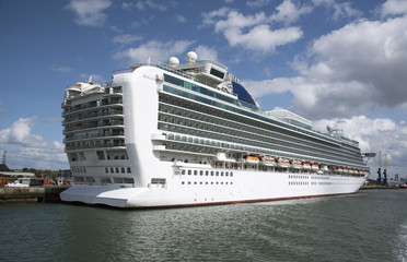 Stern view of a cruise ship sitting alongside in a British port. August 2017