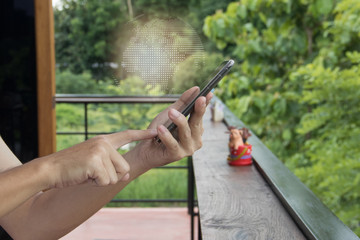 Hand hold smart phone with word map dot over screen. business concept