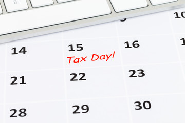 Tax day on calendar with keyboard