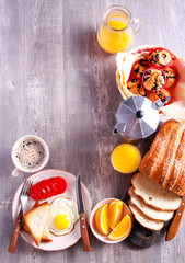 Breakfast arrangements with different food and drink