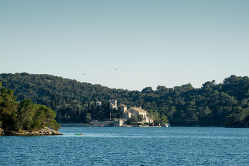 Fototapeta premium Beautiful ancient dominican monastery of Saint Mary located on an island in Mljet National Park, Croatia