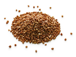 heap of buckwheat seeds from Russia isolated on white background