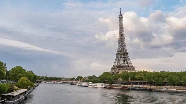 Paris city skyline motion timelapse (Hyperlapse) at Seine River and Eiffel Tower, Paris, France, 4K Time lapse