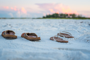 Sandals and Seashells at the Beach
