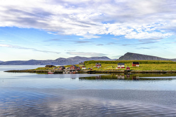 View of small fishing village in Mageroya island, Norway. Mageroya is a large island in Finnmark county, in the extreme northern part of Norway