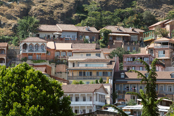 Colorful traditional houses with wooden carved balconies in the Old Town of Tbilisi, Georgia